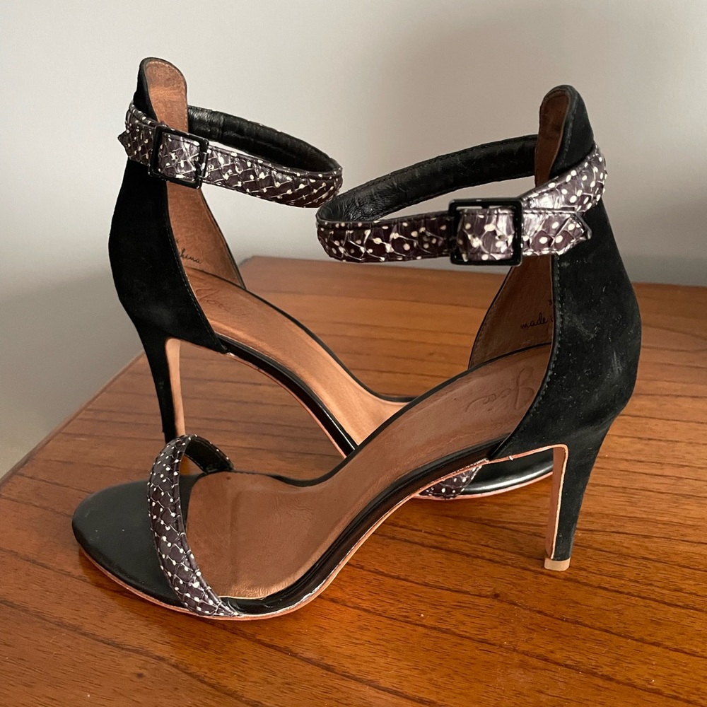 Classic ankle strap pumps, black suede with white dots on straps.